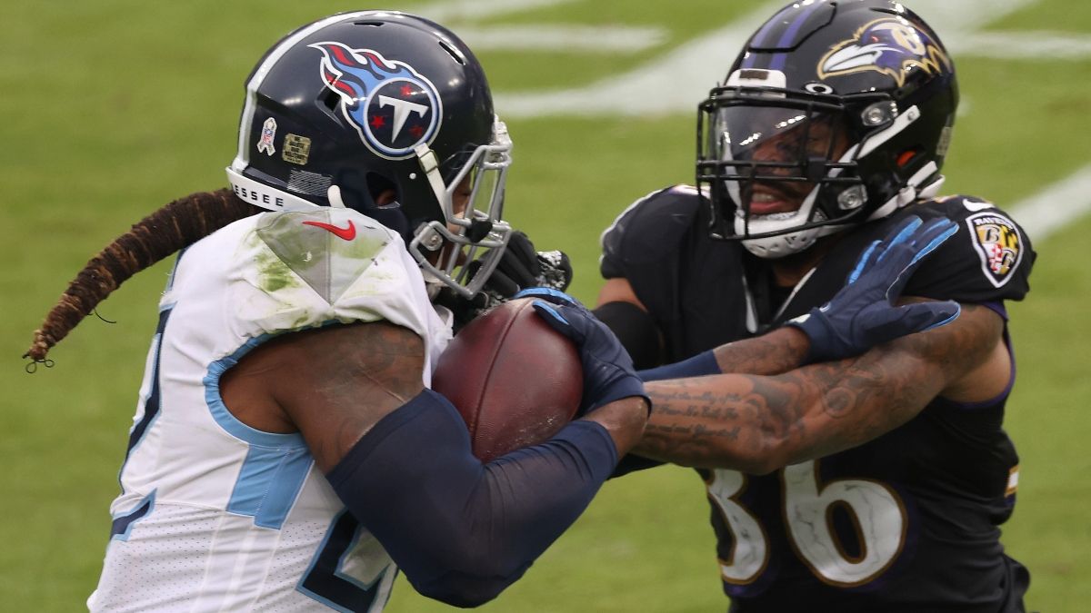 NFL Odds & Picks for Ravens vs. Titans: Money Moving Sunday’s Wild Card Playoff Over/Under article feature image