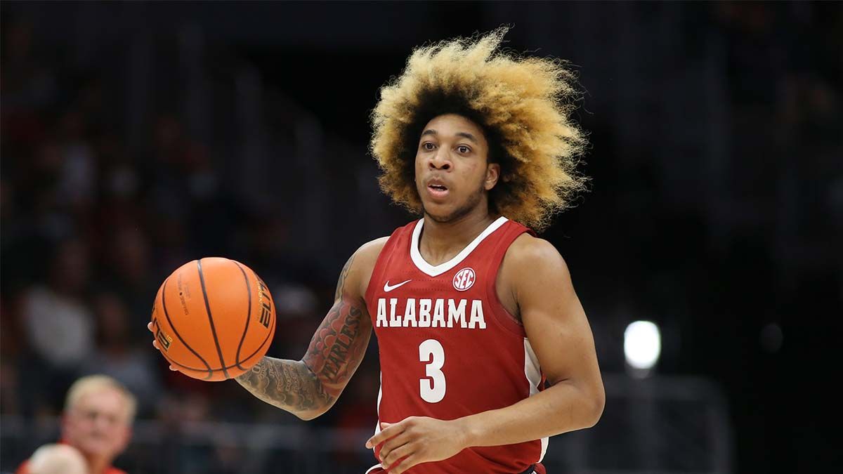 Wednesday College Basketball Odds, Picks & Predictions: Sharps Hit 7 Totals, Including Nevada vs. Kansas, Tennessee vs. Alabama article feature image
