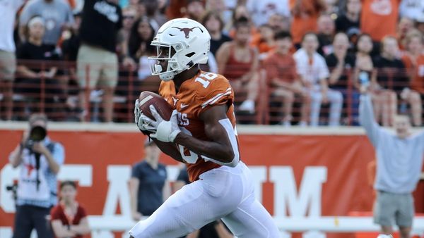 Texas WR Isaiah Neyor, OL Junior Angilau Out for Season