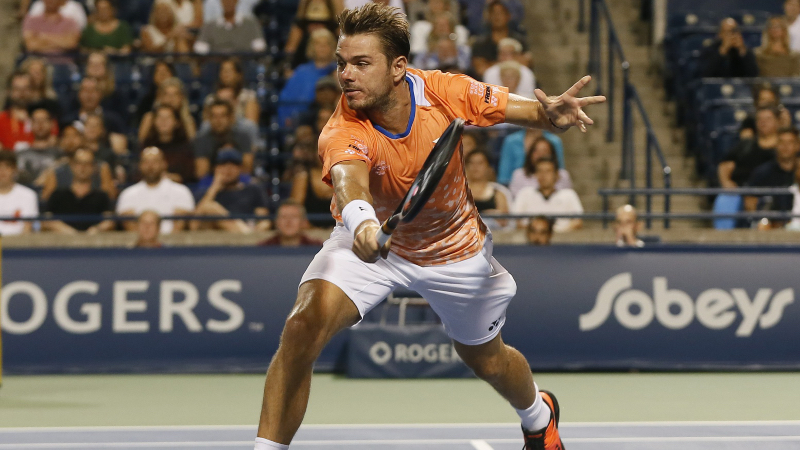 Stan Wawrinka (SUI) goes to return a ball to Rafael Nadal (not pictured) in the Rogers Cup tennis tournament at Aviva Centre.