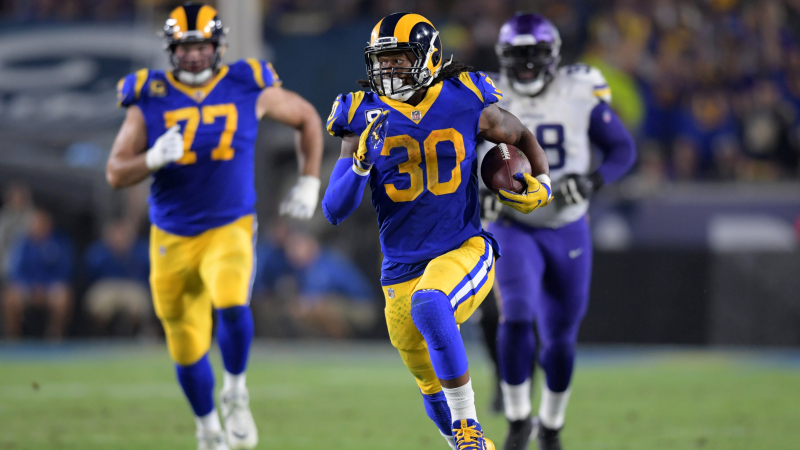 Los Angeles Rams running back Todd Gurley (30) carries the ball on a 56-yard reception in the third quarter against the Minnesota Vikings at Los Angeles Memorial Coliseum. 