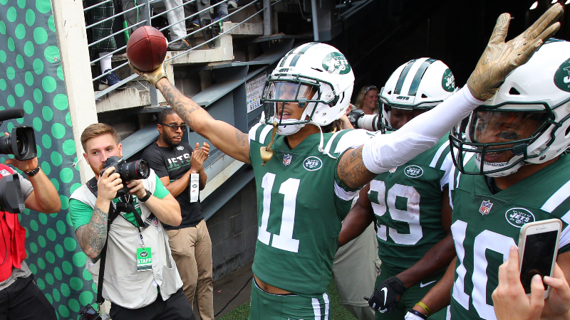 New York Jets wide receiver Robby Anderson (11) celebrates a touchdown against the Denver Broncos during the second quarter at MetLife Stadium.