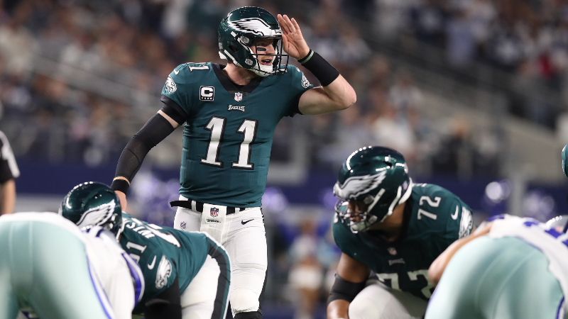 Philadelphia Eagles quarterback Carson Wentz (11) signals prior to the snap against the Dallas Cowboys at AT&T Stadium.