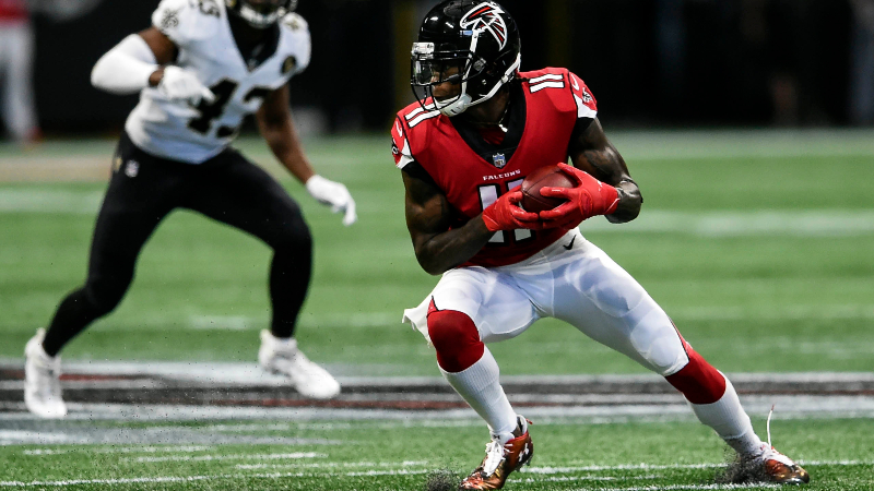 Atlanta Falcons wide receiver Julio Jones (11) makes a catch against the New Orleans Saints during the first half at Mercedes-Benz Stadium.