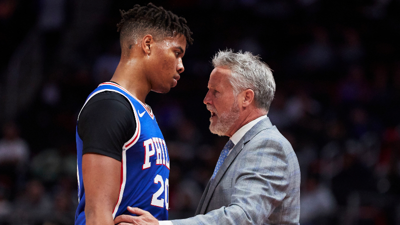 Philadelphia 76ers head coach Brett Brown talks to guard Markelle Fultz (20) in the first half against the Detroit Pistons at Little Caesars Arena.