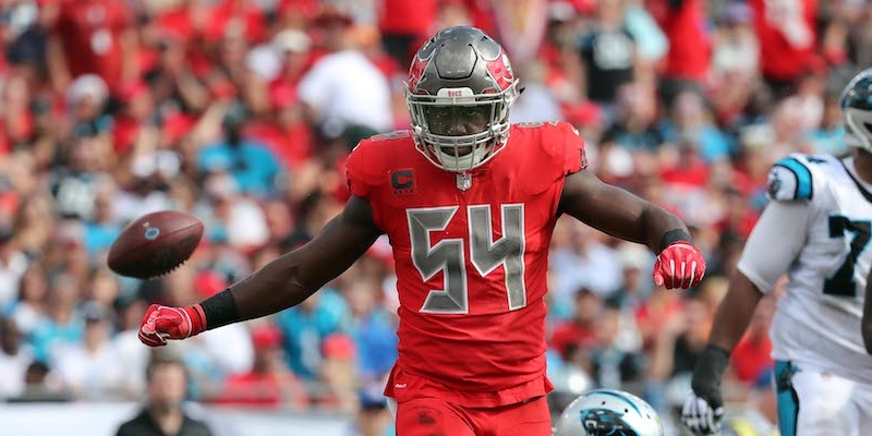 Every week I leverage my experience as a high school football coach and fantasy analyst with a statistics background to help you find an advantage when setting your fantasy football lineups and placing your bets. This week we’re focusing on the NFC matchup between the Tampa Bay Buccaneers and Dallas Cowboys. <h2><strong>Tampa Bay's Revamped Defense</strong></h2> The Bucs looked like a real disaster on defense to start the season. They allowed Drew Brees to complete 82% of his passes for 439 yards and three touchdowns en route to a 40-point performance in their Week 1 matchup against the Saints. Then what could have been a result of poor matchup turned into a trend. The Bucs allowed an average of 34.6 points over their first five games. They ranked last in net yards per attempt (8.59) and last in yards per play (6.89) over that same span. The only thing Tampa Bay was doing effectively was stopping the run, where the team was permitting just 3.76 yards per carry, good for fifth in the NFL. Then after Week 6, the Bucs fired defensive coordinator Mike Smith and promoted linebackers coach Mark Duffner. Since then, they've been much better on defense, allowing just 25.6 points per game and 6.28 net yards per pass attempt (15th). So what is Tampa Bay doing differently? For starters, the Bucs have made some major changes in personnel. They've utilized a dime defensive package a lot more under Duffner than they had under Smith. Traditional "base" personnel typically employs four defensive backs (<span style="font-weight: 400;">two corners and two safeties). "Nickel" is when a fifth defensive back comes in -- a personnel that's growing more and more in popularity every year. </span><span style="font-weight: 400;">"Dime" adds a sixth defensive back, meaning that the defense is likely playing with only one linebacker on the field.</span>   <span style="font-weight: 400;">For the Bucs, that one linebacker has been Lavonte David, who is one of the league's best coverage linebackers. Pro Football Focus grades him as the 11th best in coverage. Tampa Bay has employed safety Andrew Adams as the second "linebacker" in these sets.</span> <span style="font-weight: 400;">This package, which has been used heavily on third down, has allowed the Bucs to make massive improvements in pass defense. They've gone from allowing 8.44 yards allowed per pass attempt on third down to 6.83 since firing Smith after Week 6.</span> The Bucs also lost two of their starting linebackers, Kwon Alexander and Jack Cichy, for the season due to injury. In their places, Tampa Bay has started Devante Bond on the outside and Adarius Taylor in the middle. Both linebackers are on the smaller side at less than 240 pounds. Taylor is incredibly small, weighing in at just 230 pounds. To get an idea of just how small that is, only three middle linebackers have been drafted at 230 or fewer pounds in the past five drafts. With smaller players on the field -- Adams is 201 pounds in the box on third down, by the way -- <mark>the Bucs have been gashed on the ground. They've allowed 5.28 yards per carry since Week 7, the fourth-worst mark in the league.</mark> Not surprisingly, Bond, Taylor and Adams have all been terrible in run support. Taylor ranks 80th out of 84 qualifying linebackers in run defense. Bond ranks outside of the top 95 of all linebackers. Adams does not qualify yet, but only one safety in the entire NFL has a worse run defense grade. <div class="authorImageUpSell"><a href="https://www.fantasylabs.com?utm_source=actionnetwork.com&utm_medium=referral&utm_campaign=tan_fl_cta&utm_content=generic_inline_pros_insight"> <img class="authorPromo" src="https://images.actionnetwork.com/blog/2018/10/generic-inline-upsell-copy-11.png" alt="" width="375" height="169" /> </a></div> <h2><strong>Ezekiel Elliot, Cowboys Should Excel</strong></h2> The Cowboys are a terrible matchup for Tampa Bay. They're eighth in rushing rate and are among the top five in rushing rate on third-and-7 or fewer yards according to Sharp Football Stats. They're also ninth in yards per carry and should be getting Zack Martin back on the offensive line. <mark>Ezekiel Elliott is a must-play is a must-play in daily fantasy.</mark> He's $9,000 on DraftKings and $8,800 on FanDuel despite averaging 30.4 and 24.7 points respectively over his past six contests. Running backs against the Bucs have an average plus/minus of 6.99 on DraftKings (priced over $4,000) and 7.21 on FanDuel (priced over $6,000) since the coaching change. Elliott should pummel the Buccaneers on Sunday. Teams coming off of a shutout loss (like the Cowboys) have gone 53-41-3 (56.4%) against the spread since 2003, according to our data at <a href="https://www.betlabssports.com/" target="_blank" rel="noopener">Bet Labs</a>. <mark>Given the trend and the matchup, I feel comfortable taking Dallas at the current line of -7 (<a href="https://www.actionnetwork.com/nfl/live-odds" target="_blank" rel="noopener">see live odds here</a>).</mark> <!-- Bet Row Widget Begin --> <iframe id="an_widget_betlabs_44595" class="an_widget" style="min-width: 300px; border: none; width: 100%;" src="https://widgets.actionnetwork.com/betrow/web/?gameId=44595" height="160" sandbox="allow-scripts allow-same-origin allow-popups allow-top-navigation" data-an-app-hide="true"> </iframe> <!-- Bet Row Widget End -->