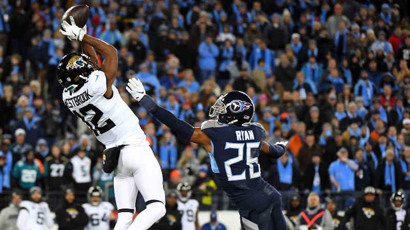 Jacksonville Jaguars wide receiver Dede Westbrook (12) catches a pass as he is defended by Tennessee Titans cornerback Logan Ryan (26) during the first half at Nissan Stadium.