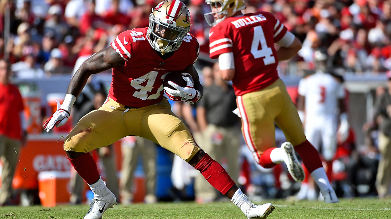 San Francisco 49ers running back Jeff Wilson Jr. (41) carries the ball against the Tampa Bay Buccaneers during the first half at Raymond James Stadium.