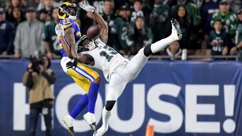 Philadelphia Eagles wide receiver Nelson Agholor (13) is unable to make a catch as Los Angeles Rams cornerback Marcus Peters (22) defends the play during the first half at Los Angeles Memorial Coliseum.