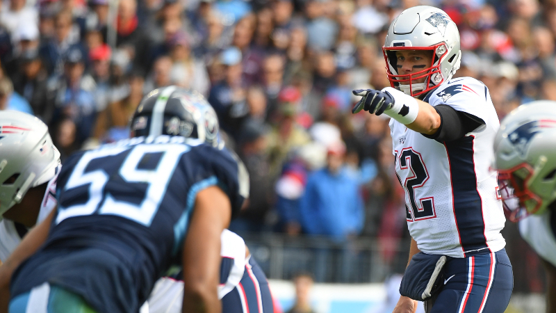 New England Patriots quarterback Tom Brady (12) calls out coverage at the line during the first half against the Tennessee Titans at Nissan Stadium.