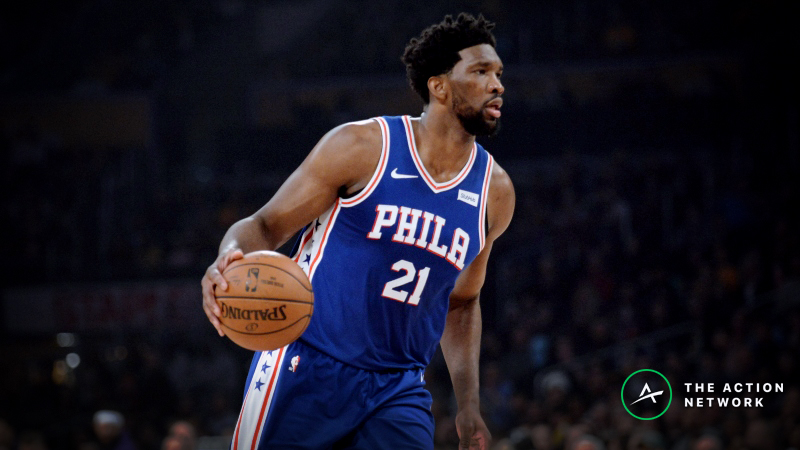 Friday’s NBA Injury Report: Betting and DFS Impact of Joel Embiid, Khris Middleton, Devin Booker Injuries article feature image