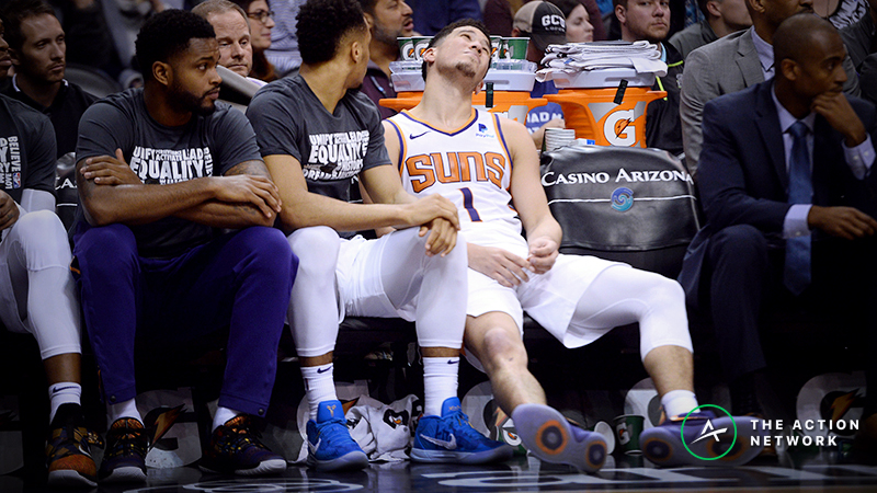 Wednesday’s NBA Injury Report: Betting, DFS Impact of Devin Booker and Spurs Injuries article feature image