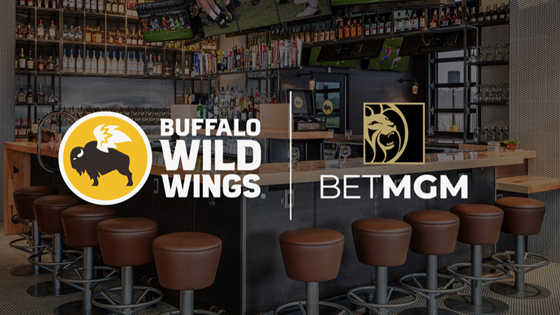 Buffalo Wild Wings Partners With MGM, Will Encourage Sports Betting in Restaurants article feature image