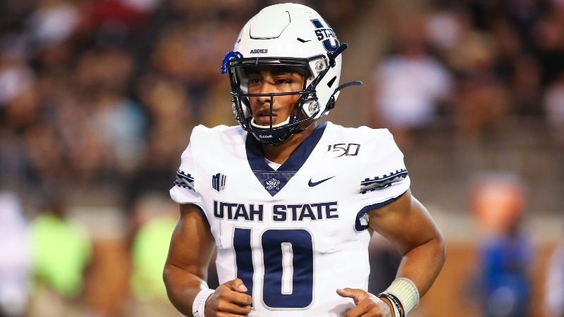 College Football Sharp Betting Report: Pros Hit WVU vs. Kansas, Utah State vs. San Diego State article feature image