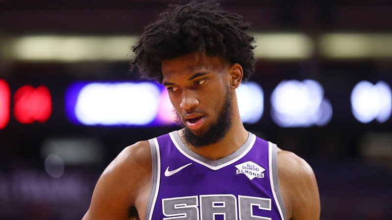 NBA Injury Report (Oct. 25): Betting, DFS Impact of Marvin Bagley & Deandre Ayton Absences article feature image