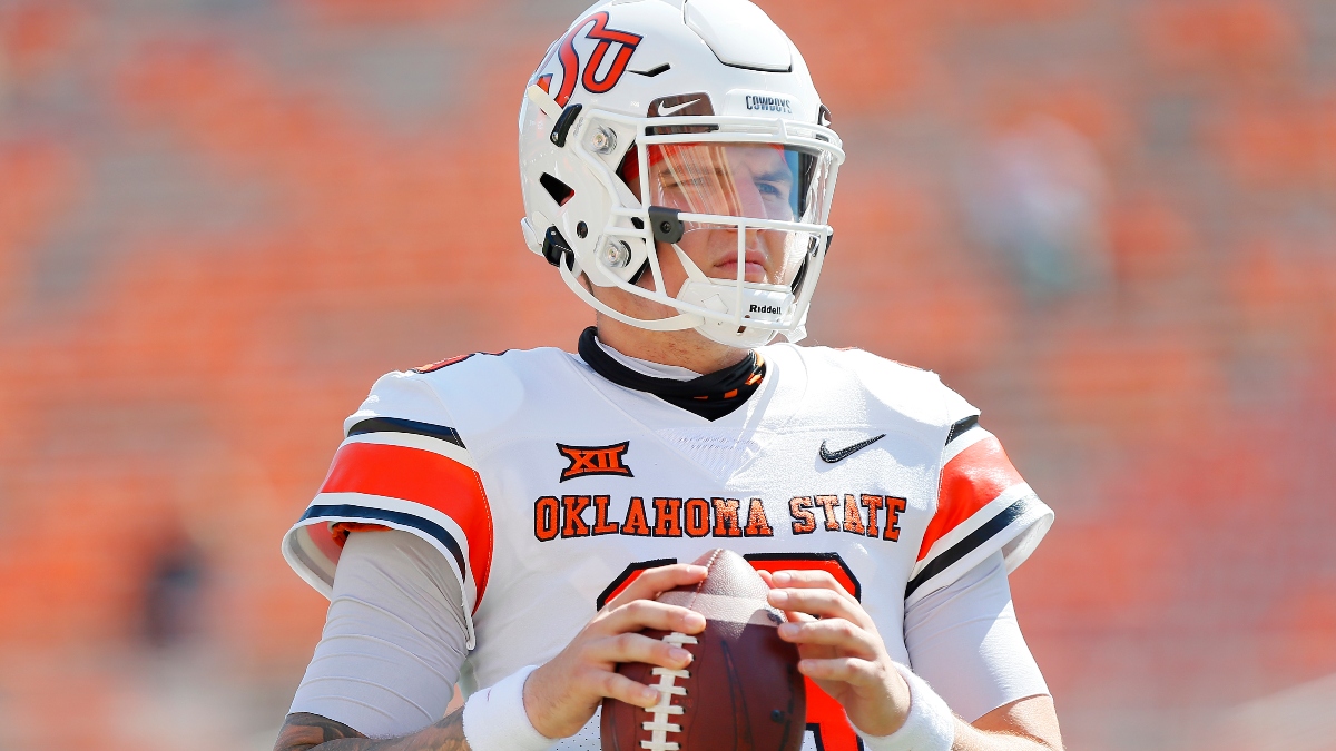 College Football Odds & Pick: Oklahoma State vs. TCU Sharp Bettors Hit Saturday’s Spread article feature image