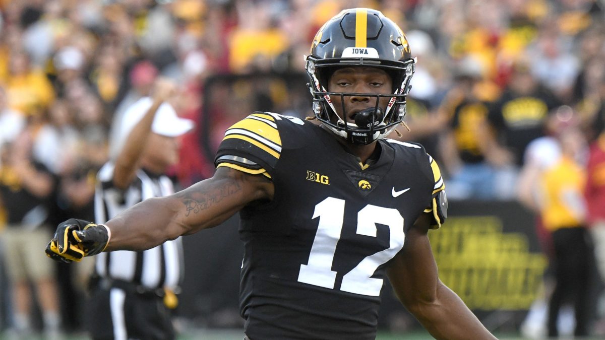 College Football Odds & Picks for Wisconsin vs. Iowa: Snow & Tough Defense Puts Betting Value on Over/Under article feature image