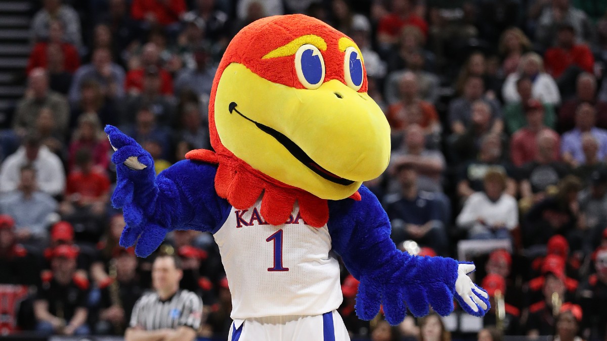 Saturday College Basketball Odds, Picks, Predictions: 10 Games Attracting Sharp Betting Action, Including Kansas vs. Texas Tech, Bradley vs. Loyola article feature image