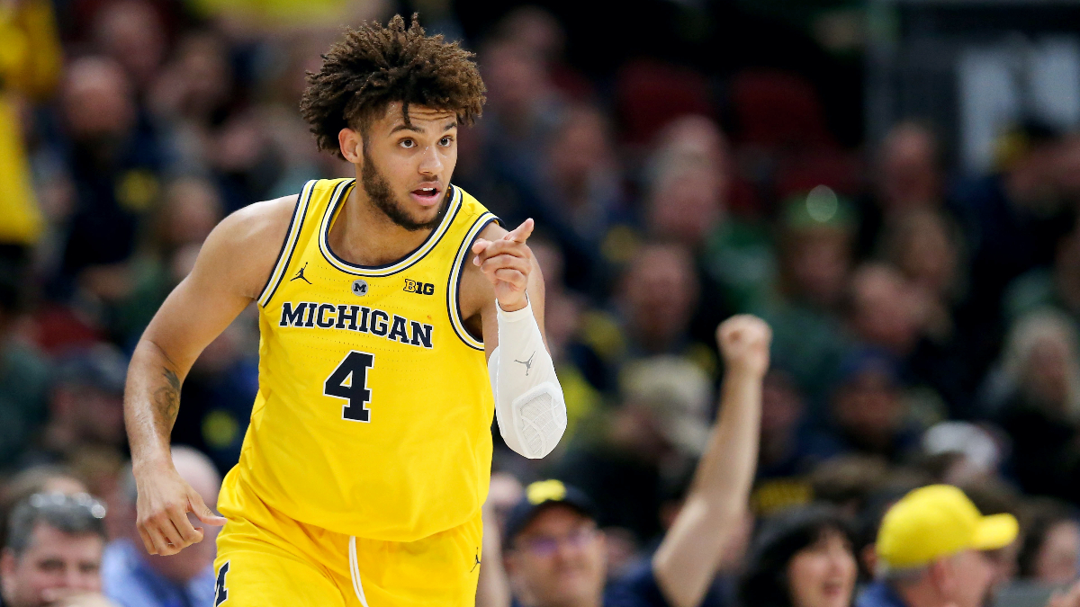 Michigan vs. Michigan State Promo: Bet $20, Win $125 on a Wolverines or Spartans 3-Pointer! article feature image