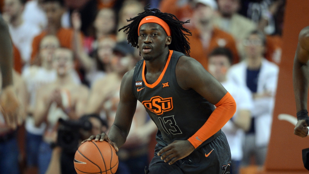 College Basketball Odds & Sharp Betting Pick: Pro Action Finally Hits Kansas vs. Oklahoma State (Tuesday, Jan. 12) article feature image