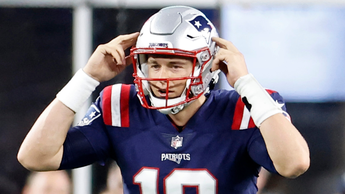 Cam Newton’s Absence Improves Odds Mac Jones Starts for Patriots in Week 1 article feature image