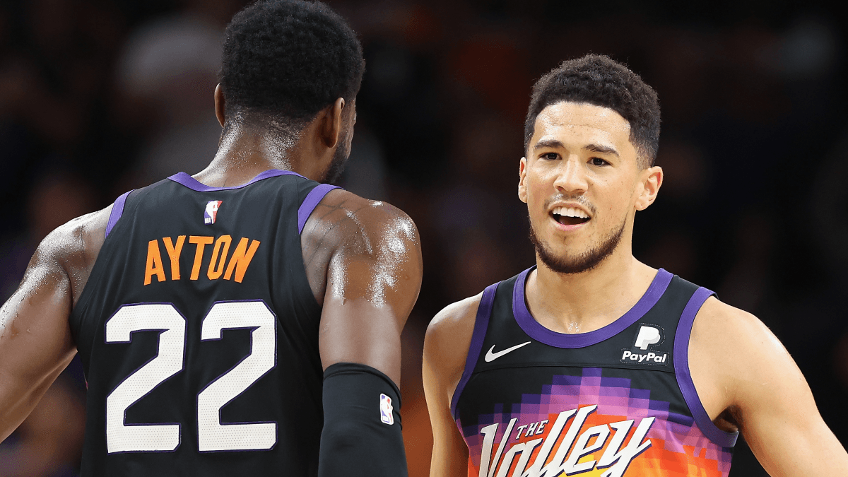 NBA First Basket Prop Odds & Picks: Finding Value in Devin Booker & Deandre Ayton for Suns vs. Mavericks Game 4 article feature image