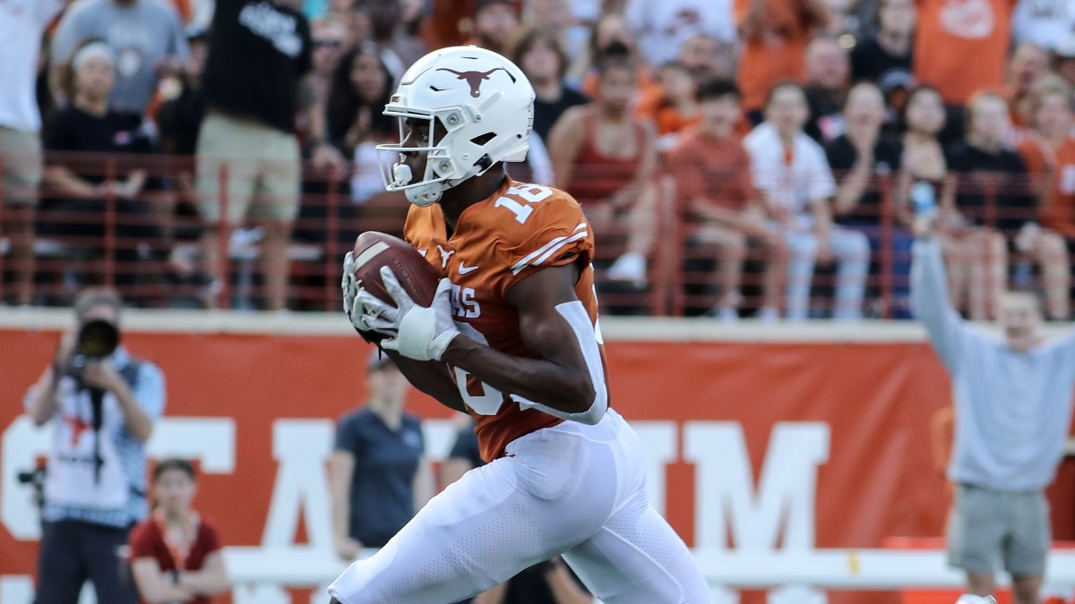 Texas WR Isaiah Neyor, OL Junior Angilau Out for Season article feature image