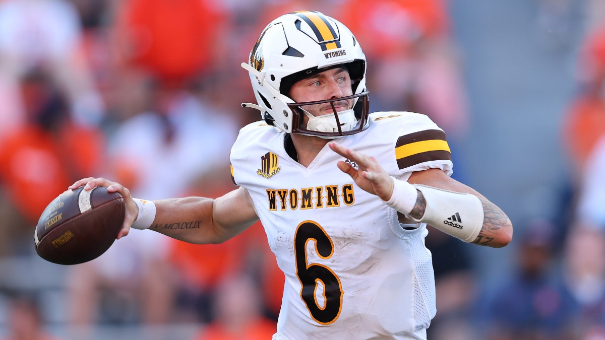 Wyoming vs. Ohio Odds for Arizona Bowl: Friday’s 58% Against-the-Spread College Football System Pick article feature image