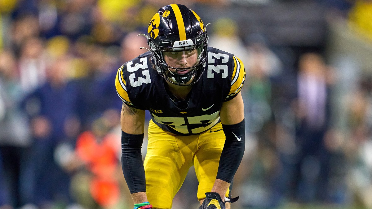 College Football Odds Picks Predictions For Iowa Vs Ohio State 