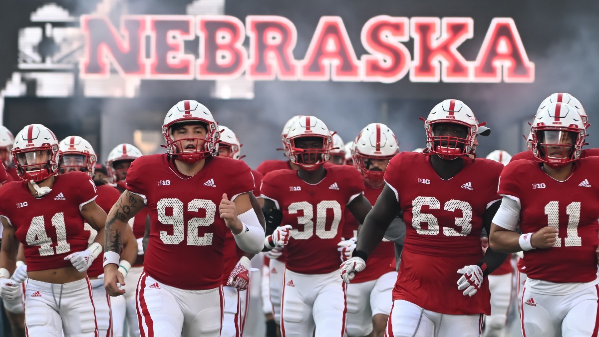 Thursday College Football Odds & Picks: 8 Best Bets, Featuring UConn vs NC State, Minnesota vs Nebraska & More article feature image