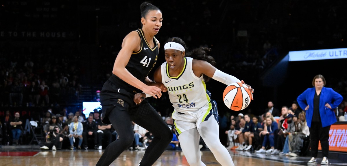 A WNBA playoff game featured three couples on the court this week
