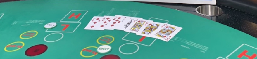 a grandmother visiting her grandkids in las vegas stopped at a las vegas casino to play pai gow poker and hit a casino jackpot of over $500,000.