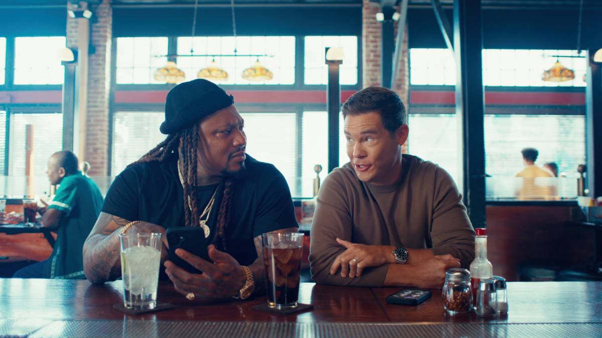 marshawn lynch and adam devine star in a new PrizePicks sports betting campaign that is funny and whimsical at the same time.