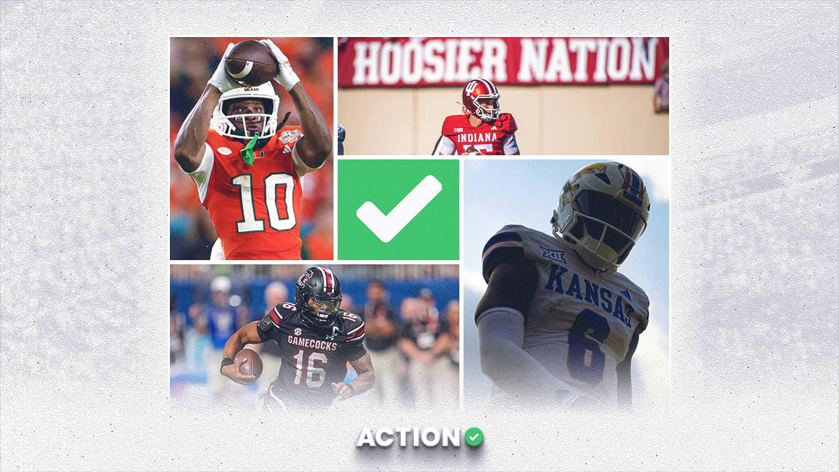 College Football Best Bets: Our Saturday Night Picks for Miami vs. Florida, Kansas vs. WVU, More article feature image