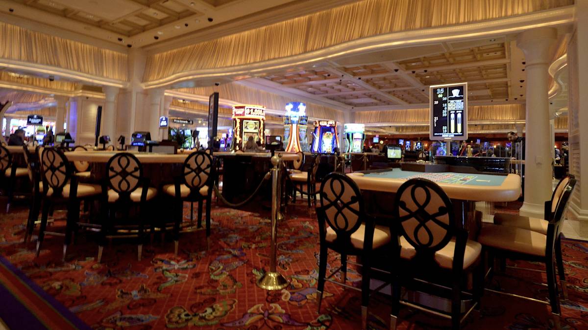 Empty table games on the gaming floor inside Encore Hotel Casino, illustrating the effects of the Las Vegas tourism decline.