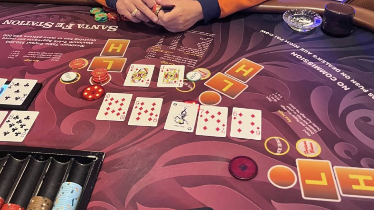 image of a rare royal flush in pai gow poker at the santa fe casino near las vegas, which was hit with the joker in play.