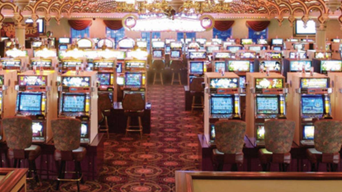 Rising Sun Casino floor illuminated at night along the Ohio River.