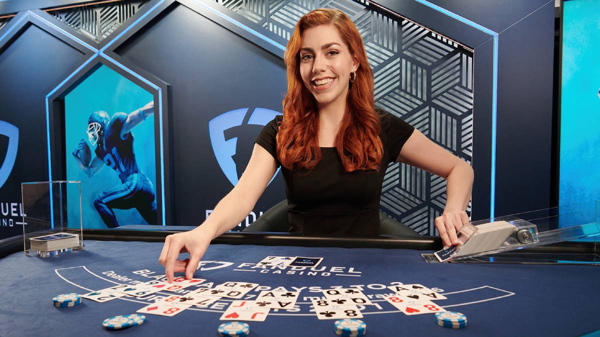 Image of a live dealer at FanDuel Casino, celebrating the first anniversary of the Rewards Club with a 100 million bonus spins giveaway, showcasing FanDuel's dedication to player rewards and enhancing the gaming experience."