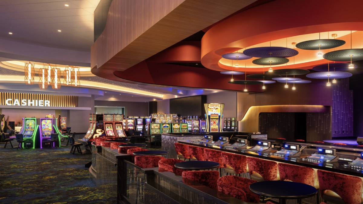 The elegant show lounge at the Grand Island Casino Resort, part of a luxurious 162-room hotel. The resort features dining options like Ruthie’s Steakhouse and a spa, all reflecting Nebraska's heartland landscapes. Plans for expansion include increasing parking capacity to welcome more visitors.