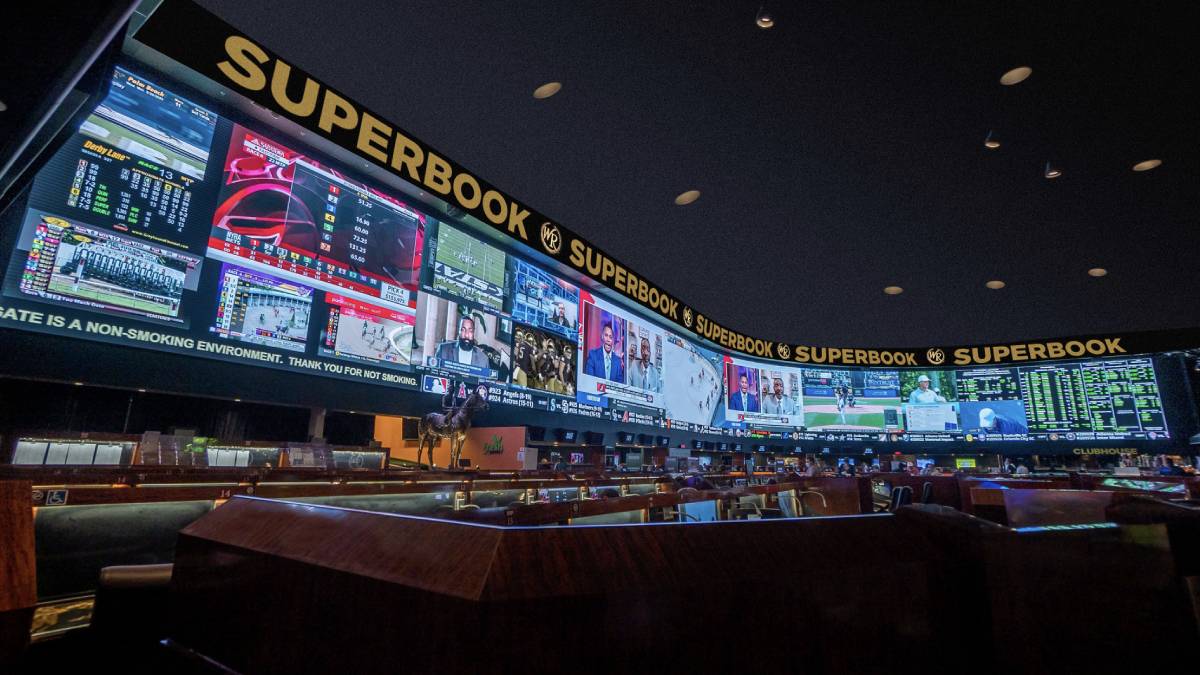 View of the Westgate SuperBook race and sports book with large video wall and seating in Las Vegas.