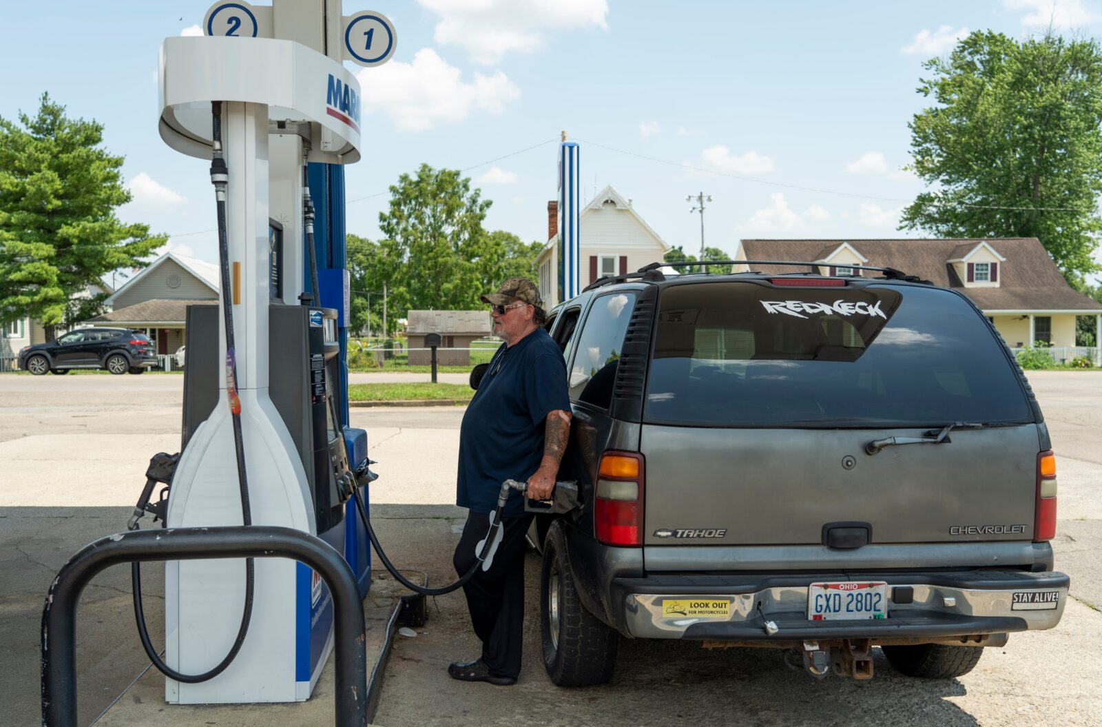 Eddie Grubb, of Kingston, pumps gas into his Chevrolet Tahoe at the Village Express Kingston on June 24, 2025, in Kingston, Ohio. . According to the USA Today, Iran's parliament approved a measure June 22 endorsing the closure of the Strait of Hormuz, a major oil transportation route, following U.S. airstrikes in Iran. Around 20% of the world's oil and gas flow through the narrow channel connecting the Persian Gulf to the Gulf of Oman. Its closure would likely mean rising fuel costs for global consumers, including Americans.