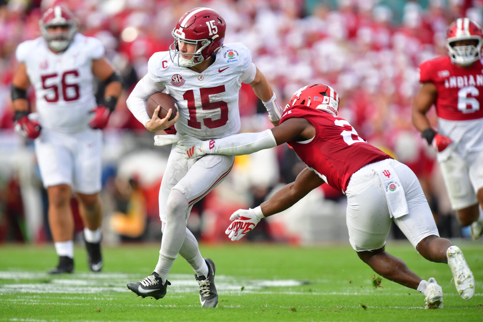 Alabama Crimson Tide quarterback Ty Simpson runs against Indiana Hoosiers linebacker Rolijah Hardy in the first half of the 2026 Rose Bowl and quarterfinal game of the College Football Playoff at Rose Bowl Stadium.