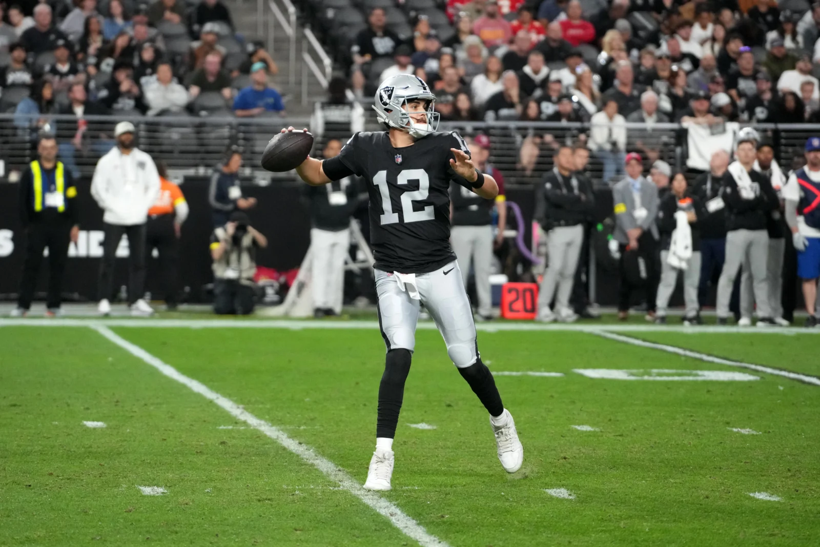 Las Vegas Raiders quarterback Aidan O'Connell (12) throws the ball against the Kansas City Chiefs in the second half at Allegiant Stadium. Mandatory Credit: Kirby Lee-Imagn Images