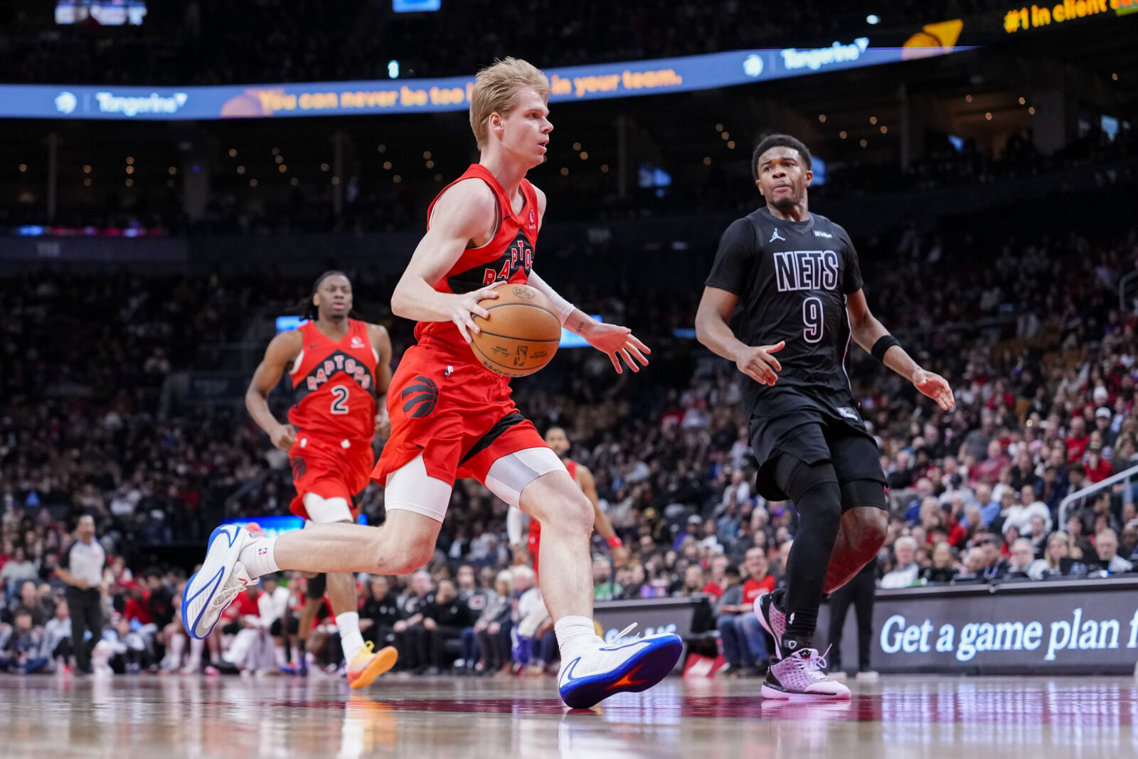 Apr 12, 2026; Toronto, Ontario, CAN; Toronto Raptors guard Gradey Dick (1) drives to the basket against the Brooklyn Nets during the second half at Scotiabank Arena.