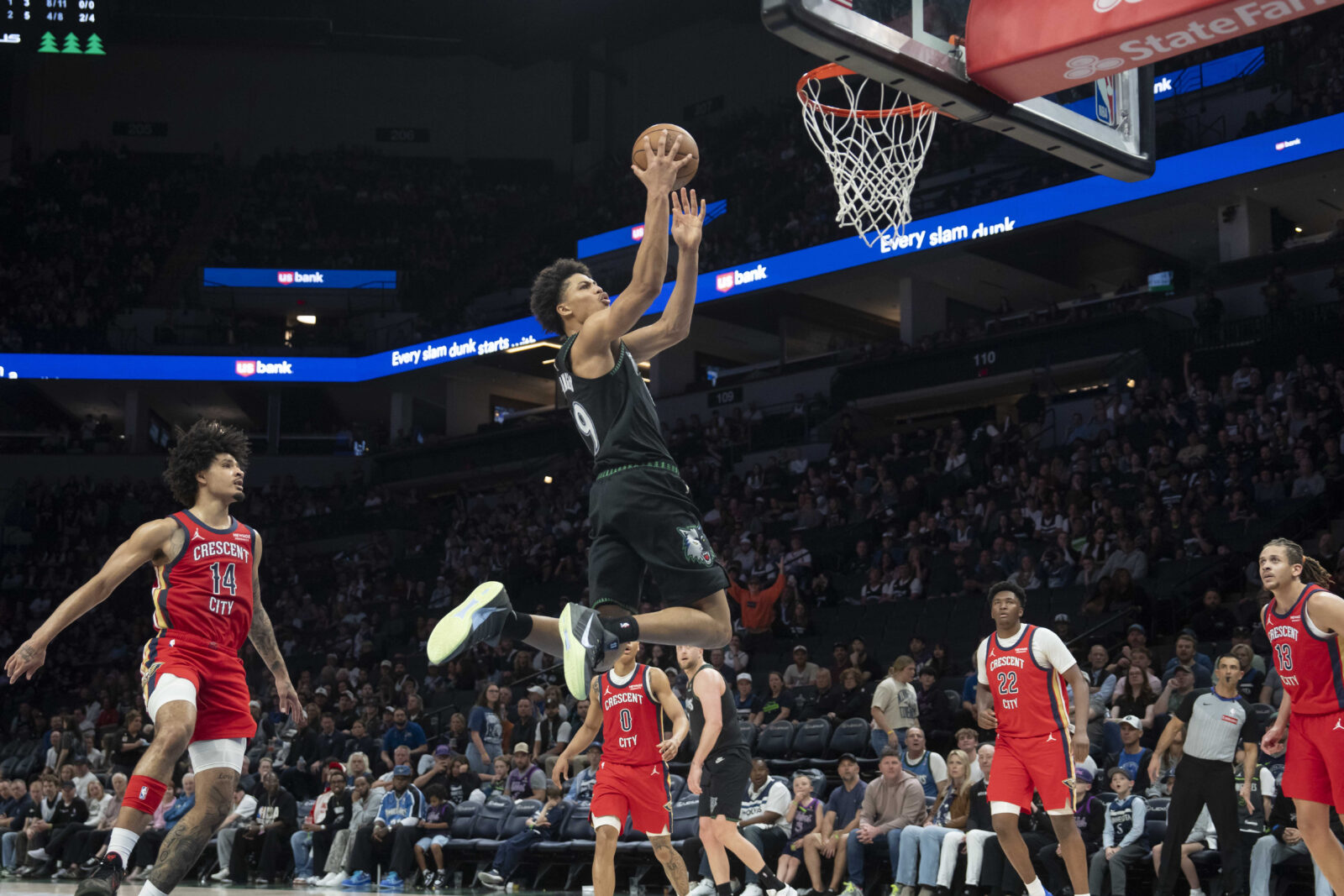 Apr 12, 2026; Minneapolis, Minnesota, USA; Minnesota Timberwolves forward Joan Beringer (19) drives to the basket against the New Orleans Pelicans in the second half at Target Center.