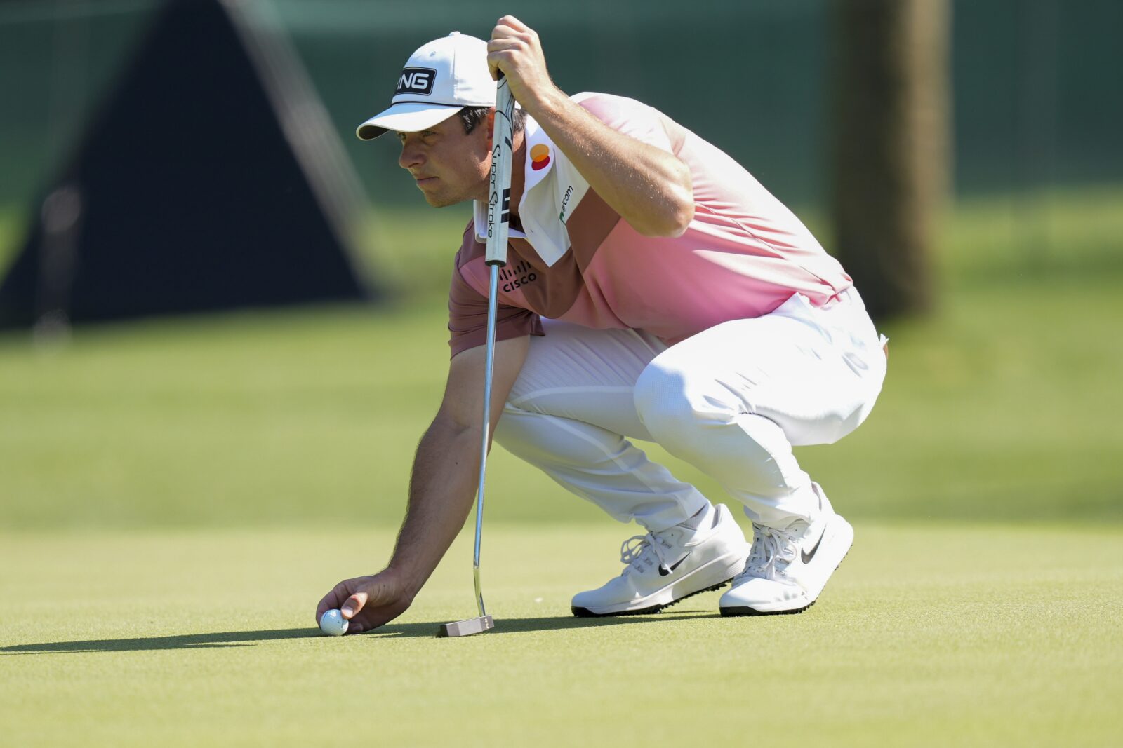 Apr 16, 2026; Hilton Head, South Carolina, USA; Viktor Hovland sets his ball on the second green during the first round of the RBC Heritage golf tournament.
