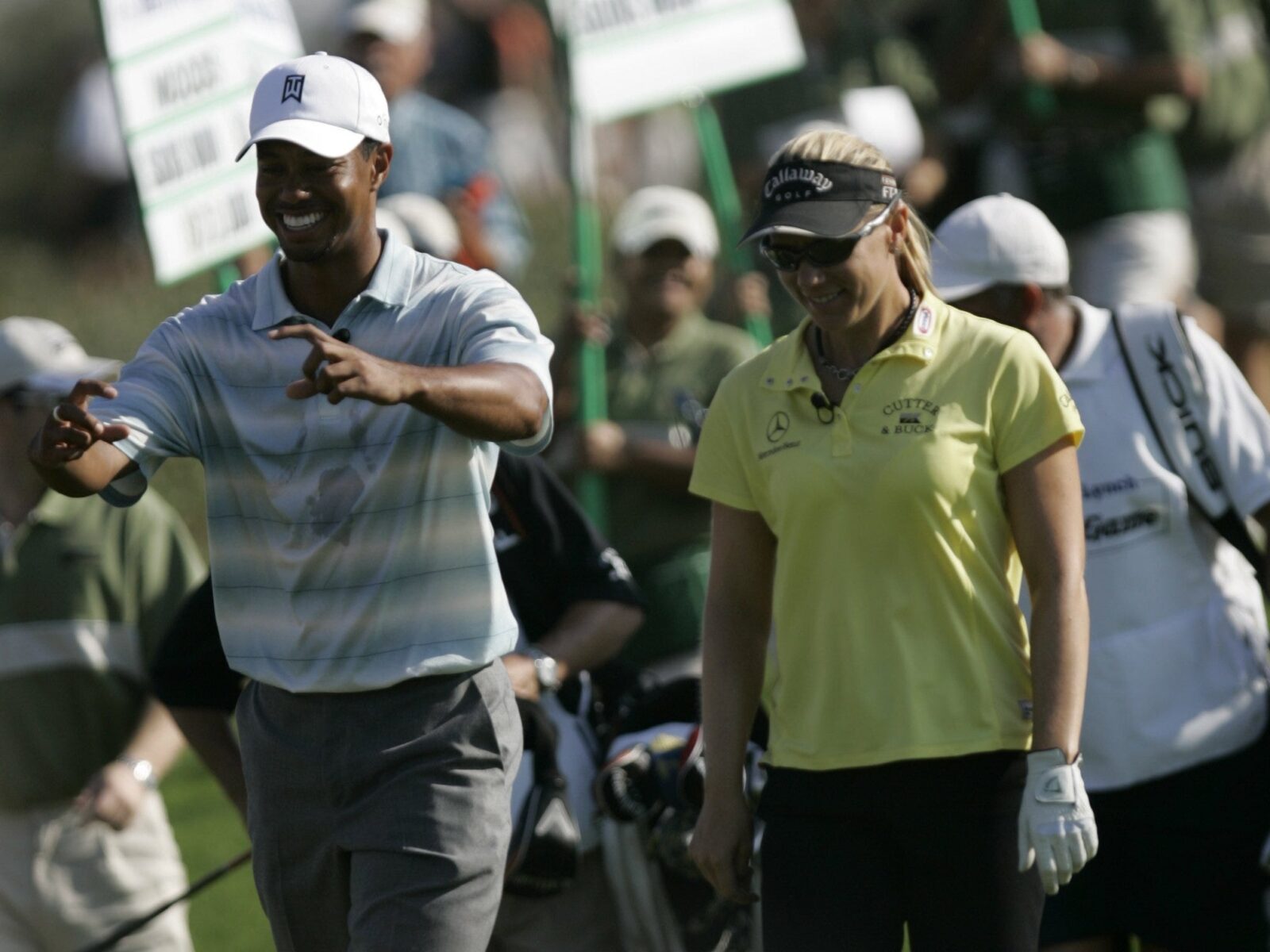 Tiger Woods enjoys a moment with Annika Sorenstam during the 2005 Skins Game.