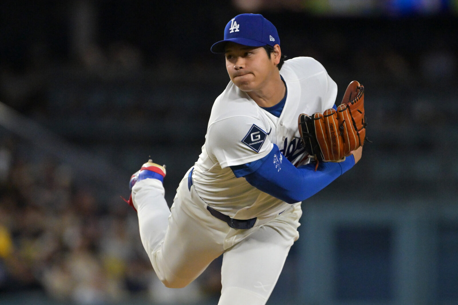 Los Angeles Dodgers starting pitcher Shohei Ohtani delivers to the plate in the fifth inning against the Miami Marlins at Dodger Stadium.
