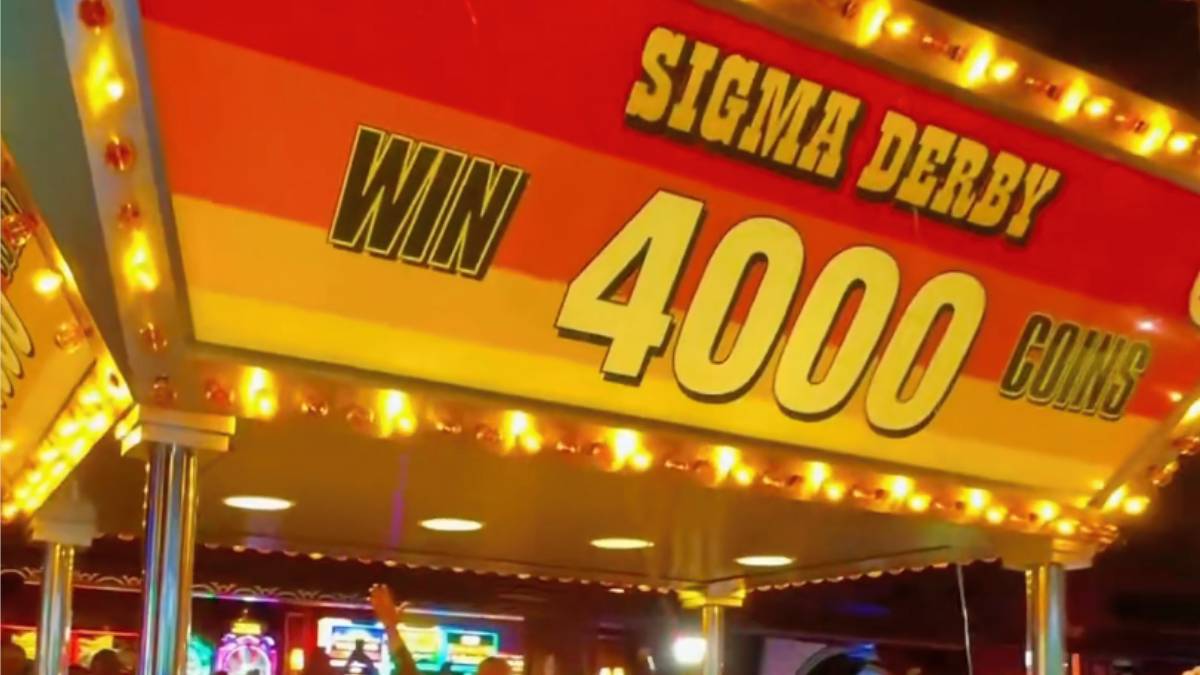 Vintage Sigma Derby machine showcasing electro-mechanical design and racing track