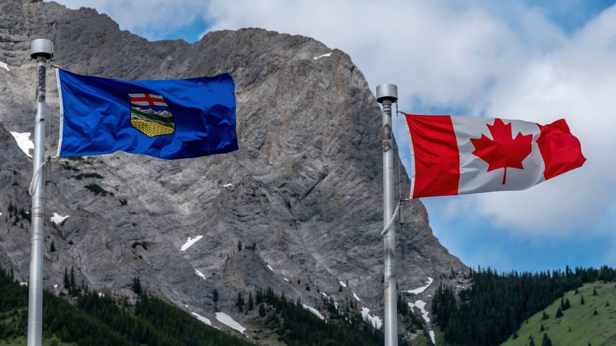 The canadian and Alberta flags where there will be an iGaming launch in July 2026 featuring sports betting app and casino integration.